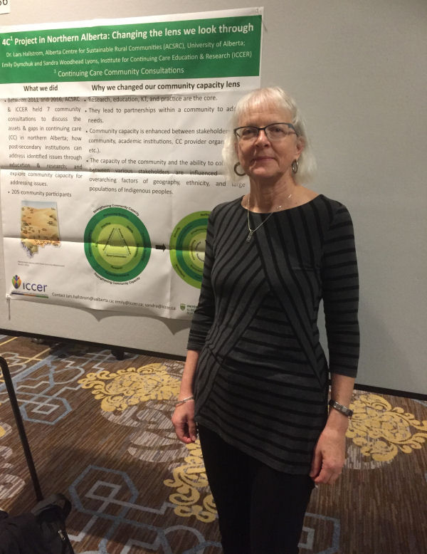 Sandra Woodhead Lyons presenting the poster for the 4C Project in Northern Alberta